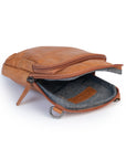 Open Sophie Bag showing soft leather interior and zip closure, ideal as a stylish leather purse for on-the-go adventures.