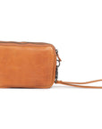Small leather purse with wrist strap, featuring zip closure and minimalist design, perfect for organization.