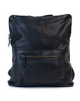 Brooklyn Backpack in black leather, featuring a minimalist design and front zip pocket for essentials.