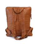 Brooklyn leather backpack with wide adjustable straps, minimalist design, and durable exterior, perfect for everyday adventures.