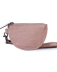 Dusty pink leather coin purse with wrist strap and zip closure, perfect for coins and essentials.