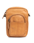 Face the Music mini camera bag in soft tan leather with adjustable strap and zip closures for daily essentials.