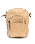 Face the Music bag, a mini leather camera bag with zip closure and front pocket, perfect for daily essentials.