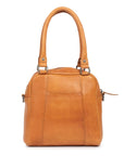 Suki leather purse by Dusky Robin with structured design and rolled handles in tan color.