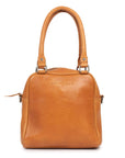 Suki leather purse by Dusky Robin Leather, featuring structured design and rolled handles, perfect for any occasion.